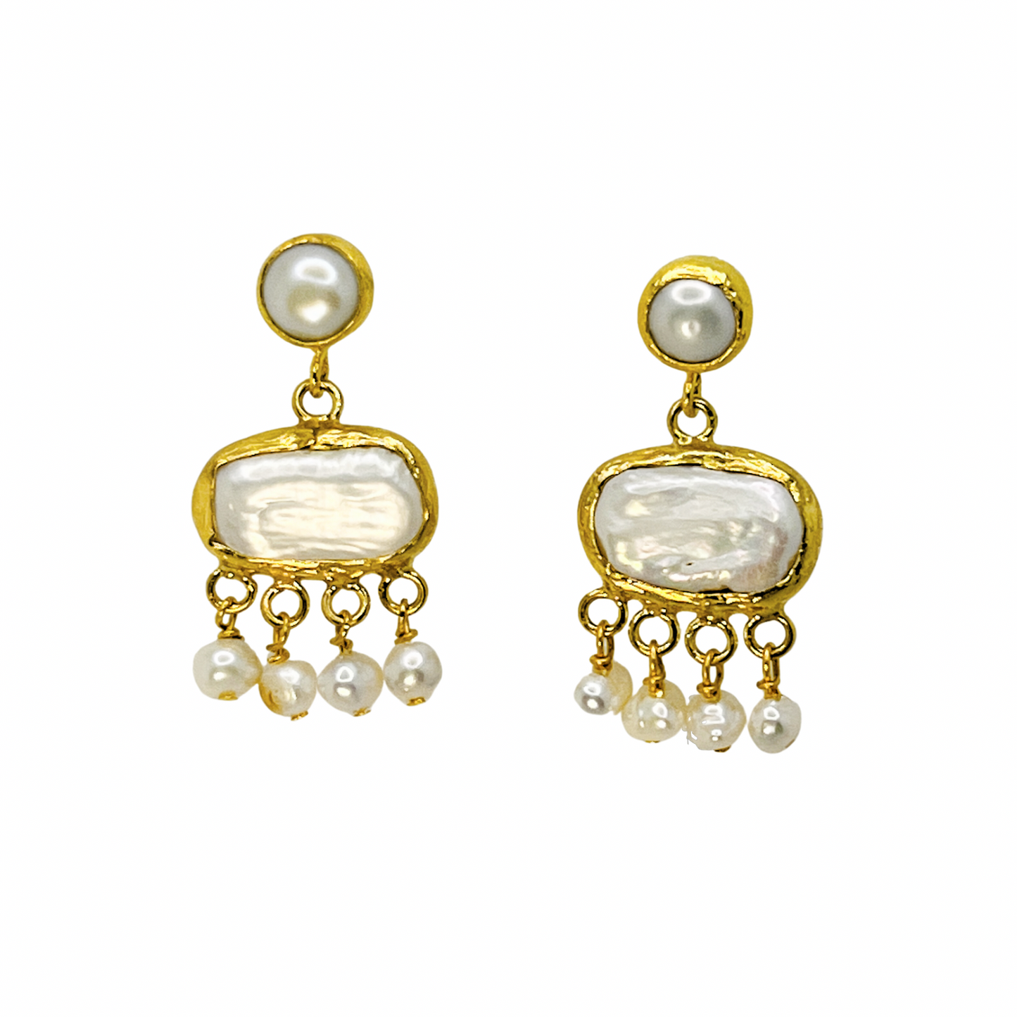 Pair of gold and pearl earrings on a white background