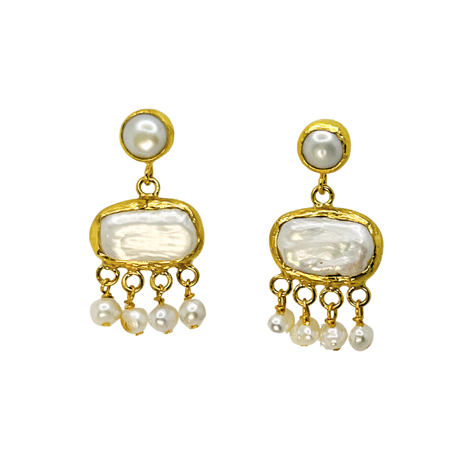 Pair of gold and pearl earrings on a white background