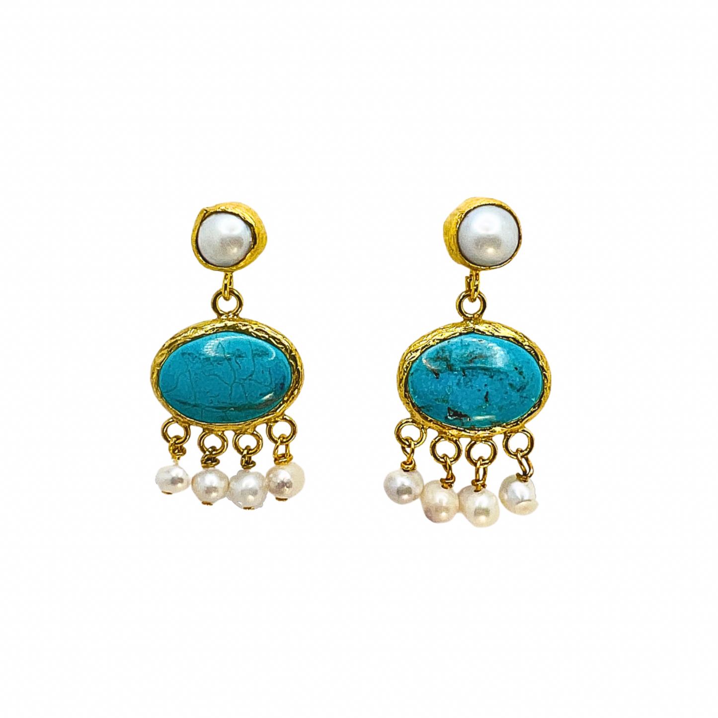 Pair of earrings with turquoise stones and pearl accents on a white background