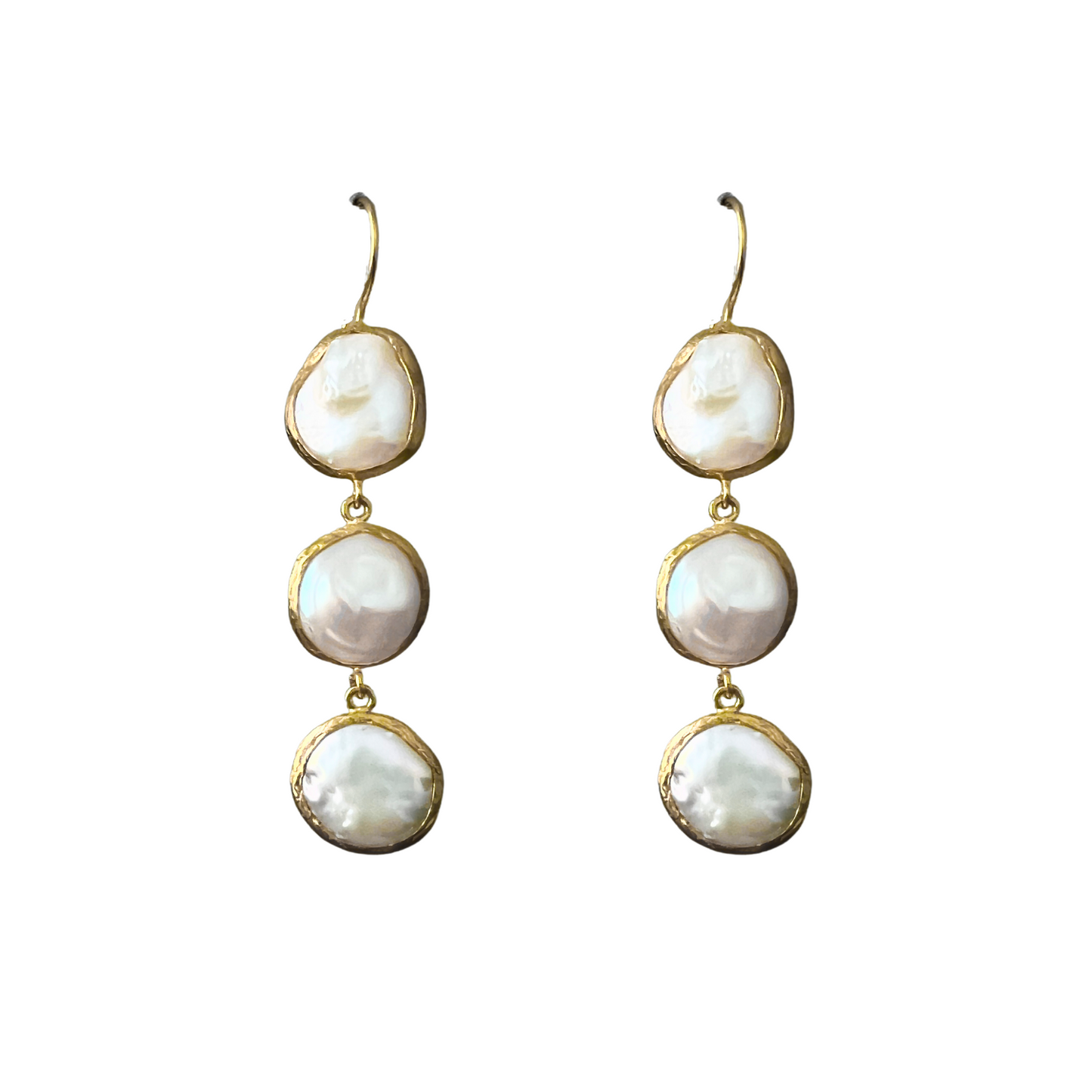 Pair of gold-framed pearl earrings on a white background